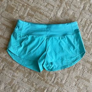 NWT. Lululemon 2.5 length, aqua/turquoise , size 4.